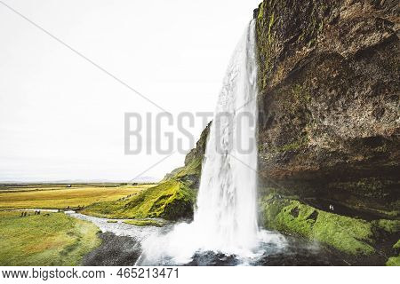 Water Falling Over The Rock Formation - Seljalandsfoss, Gljufrabui Waterfall