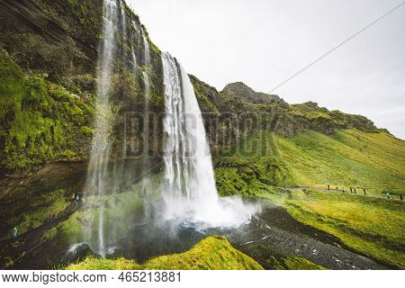 Wide Angle Shot Behind Of Majestic Gljufrafoss Waterfall In Iceland