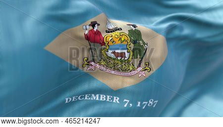 Close-up View Of The Delaware State Flag Waving In The Wind. Delaware Is A State In The Mid-atlantic