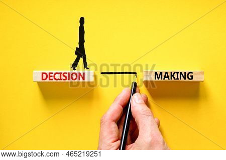 Decision Making Symbol. Concept Words Decision Making On Wooden Blocks. Beautiful Yellow Table Yello