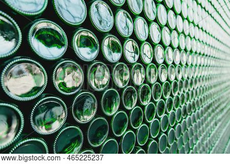 Glass Bottles Green. Green Glass Bottles Of Beer. Wall Formed By Green Bottles. Green Bottles Backgr
