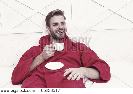 A Fresh Drink For Breakfast. Happy Man Drinking Coffee For Breakfast. Handsome Guy Enjoying His Brea