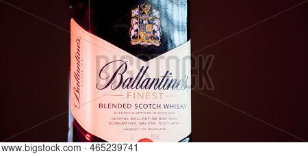 Ballantines Whiskey Bottle With Colorful Lights Background In Bar. Ballantines Concept. Whiskey Conc