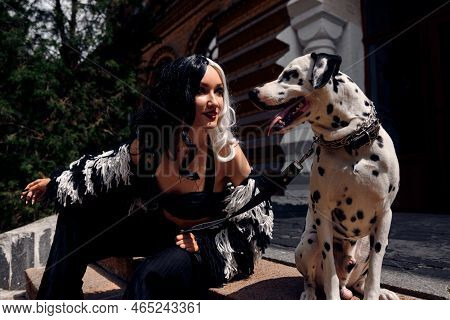 Cosplay On Cruella De Vil With A Dalmatian