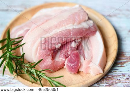Fresh Raw Streaky Pork Meat For Cooking Food, Pork Skin Pig Skin, Pork On Wooden Plate With Rosemary