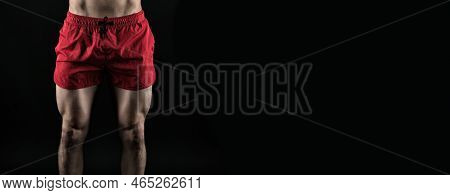 Cropped View Of Sportsman Quadriceps. Fitness Sportsman With Quadriceps Isolated On Black.