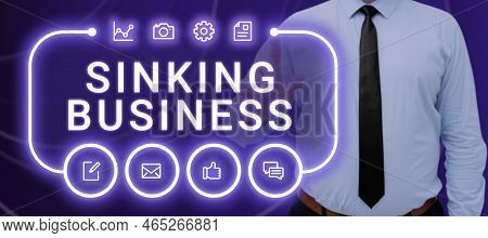 Hand Writing Sign Sinking Business. Business Approach The Company Or Other Organization That Is Fail