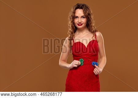 Casino Concept. Portrait Of Young Brown-haired Caucasian Woman, Playing In Casino. Roulette, Poker C