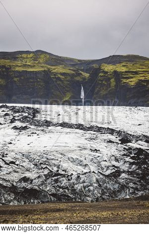 Fantastic View On Solheimajokull Glacier Waterfall Behind