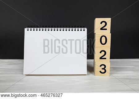 2023 Calendar Mockup.text 2023 On Wooden Cubes. Place For Your Text In Notepad, Calendar Layout. New
