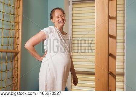 Pregnant Woman Trying To Breath To Soothe The Pain Of Her Labor Contractions