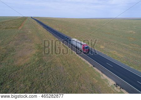 Kalmykia, Russian Federation - September 21, 2021: Road Train On The R-216 Highway On A Sunny Septem