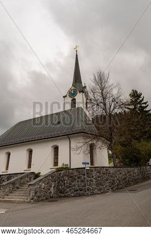 Wildhaus, Switzerland, May 5, 2022 Catholic Church In The Center On An Overcast Day In Spring Time