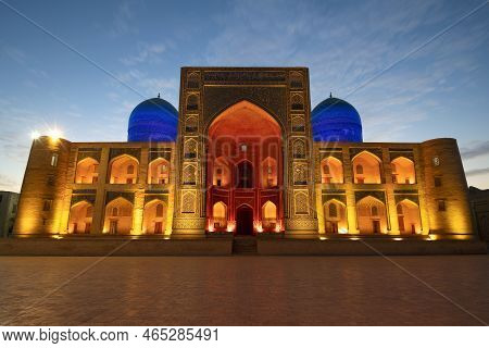 Bukhara, Uzbekistan - September 11, 2022: Mir-i-arab Madrasah In Night Illumination On A Early Morni