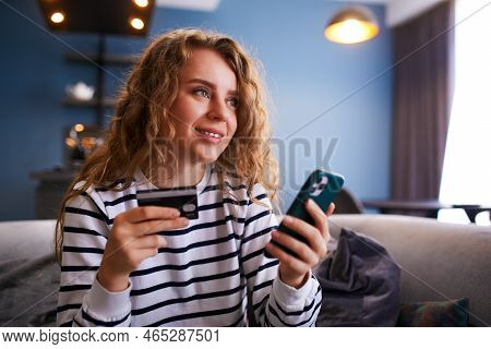 Happy Woman Makes Purchase, Payment In Fintech App On Phone. Shopper Girl Uses Mobile Banking App, C