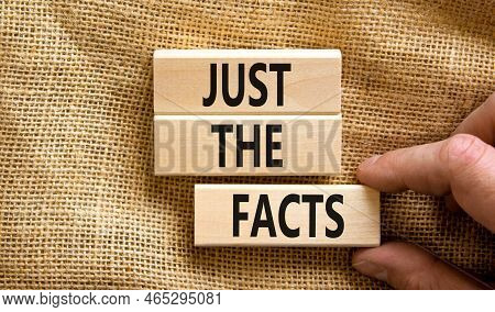 Just The Facts Symbol. Concept Words Just The Facts On Wooden Blocks On A Beautiful Canvas Table Can