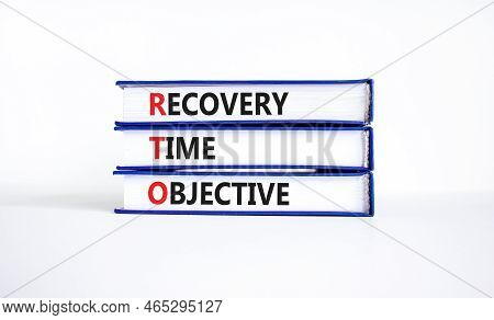 Rto Recovery Time Objective Symbol. Concept Words Rto Recovery Time Objective On Books On A Beautifu