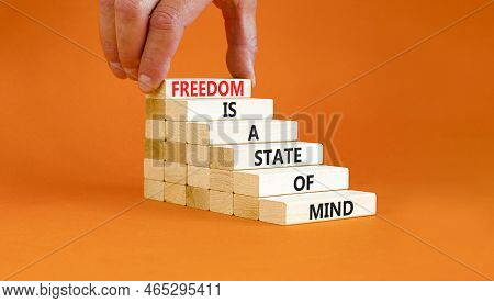 Freedom In Mind Symbol. Concept Words Freedom Is A State Of Mind On Wooden Blocks On A Beautiful Ora