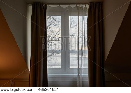 Window View To The Outside From A Cozy Room