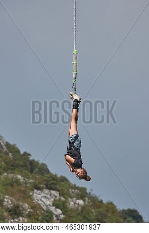 Bungee Jumping Girl Hanging On The Rope Screaming In Excitement