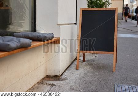 Empty Menuboard On In Front Of A Restaurant, Blank Chalkboard, No Text