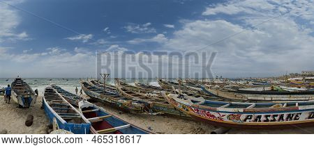 Nouakchott. Mauritania. October 04, 2021. Hundreds Of Huge Painted Wooden Boats, On Which Local Fish