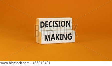 Decision Making Symbol. Concept Words Decision Making On Wooden Blocks. Beautiful Orange Table Orang