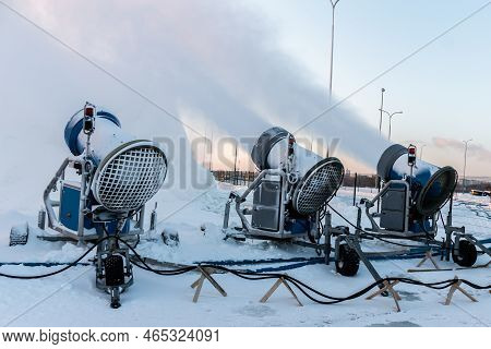 The Snow Cannons Sprays Artificial Snow Crystals. Cars Make Snow. Artificial Snow System. Snow Guns.