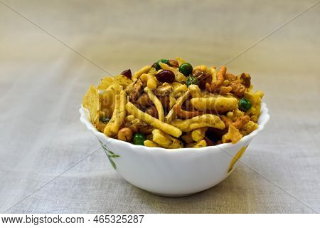 Mix Chanachur Over White Background Named Bombey Mix. Popular Tea-time Food In India. Selective Focu