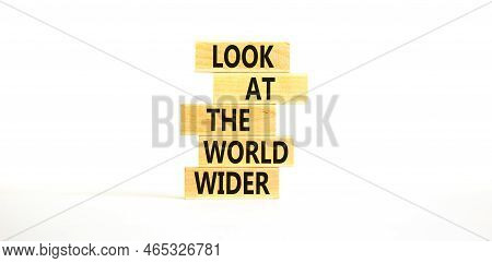 Look At The World Wider Symbol. Concept Words Look At The World Wider On Wooden Blocks On A Beautifu