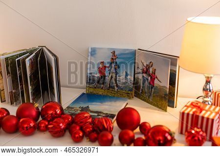 A Photobook Of Family.photobook Is Gift. Photo Album Next To Gifts