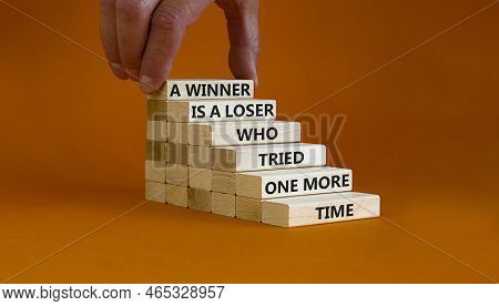 Winner Or Loser Symbol. Wooden Blocks With Words A Winner Is A Loser Who Tried One More Time. Beauti