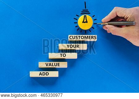 Add Value To Your Customers Symbol. Concept Words 'add Value To Your Customers' On Wooden Blocks On 