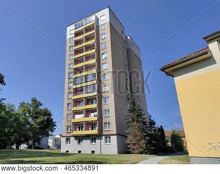 Dobris, Czech Republic - July 24, 2022: High Old Style Apartment Building In Small Czech Town With B