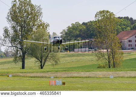 Lommis, Switzerland, May 11, 2022 Piper Pa28-181 Archer Iii Propeller Plane Is Departing From A Smal