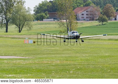 Lommis, Switzerland, May 11, 2022 Piper Pa28-181 Archer Iii Propeller Plane On The Grass Runway On A