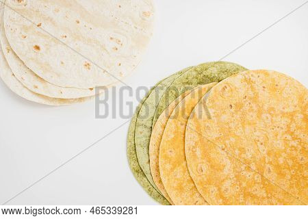 Tomato, Spinach Flavored And Plain Wheat Tortilla Wraps. Spanish Or Mexican Circular Unleavened Flat