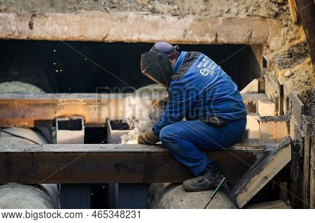 Bucharest, Romania - November 10, 2022: Details With A Professional Welder Welding An Industrial Met