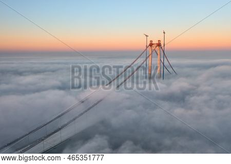 Panoramic Aerial Drone View From Above Of The Suspended Bridge Over Danube River, Under Construction