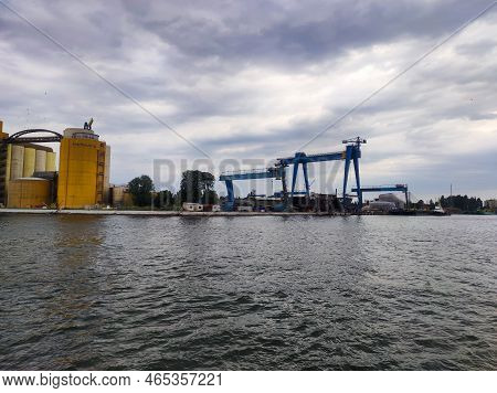 Gdansk Poland, July 18, 2022: Container Ships In Commercial Harbour. Harbour In Gdansk. Iindustrial 