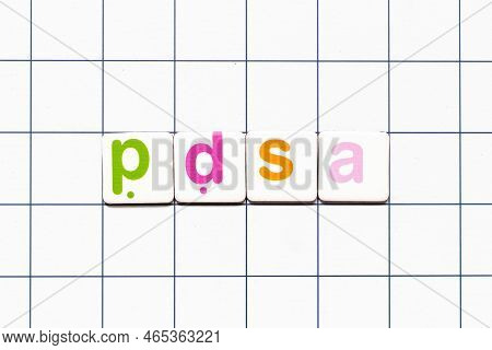 Colorful Tile Letter In Word Pdsa (abbreviation Of Plan Do Study Act) On White Grid Background