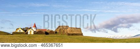 Panorama Of The Village Of Glaumbaer, Iceland, With Traditional Turf Covered Houses And Small Red An