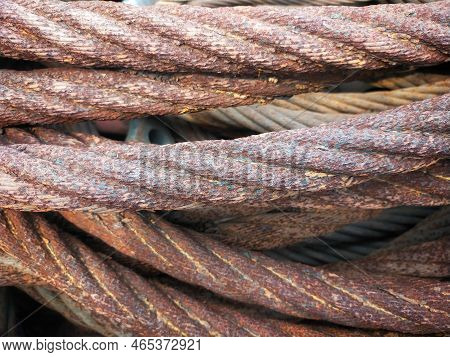 Selective Focus Of A Pile Of Rusty Wire Slings.