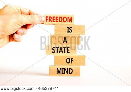 Freedom In Mind Symbol. Concept Words Freedom Is A State Of Mind On Wooden Blocks On A Beautiful Whi