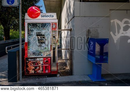 Lausanne, Vaud, Switzerland - 21 September, 2022: Damaged Selecta Vending Machine. Broken Glass. Vio