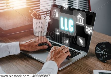 Limited Liability Company (llc) Business Concept, Person Hand Using Computer And Hand Touching Limit