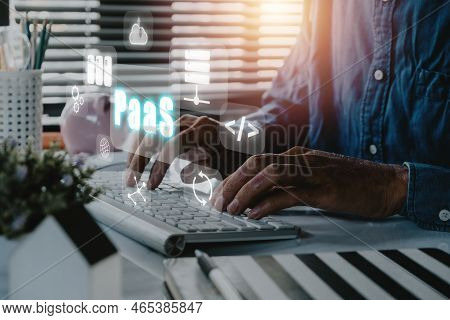 Paas - Platform As A Service, Man Using Computer With Paas Icon On Vr Screen On Desk Background, Int