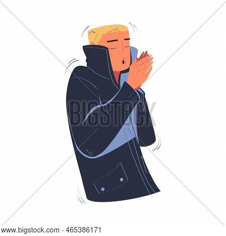 Young Man Freezing And Shivering Wearing Warm Clothes, Scarf And Earmuffs. Guy Trying To Warm During