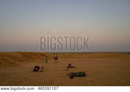 Moon Set. View Of Thar Desert Sand Dunes , Pre Dawn Light Before Sun Rise And Moon Setting Off In Th