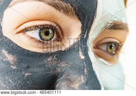 Woman Cleaning Skin Face, Using Green Mud And Carbo Black Mask. Girl Taking Care Of Oily Complexion.